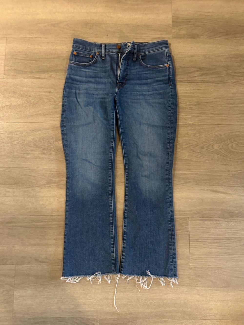 Madewell mid-rise Kick Out Jeans with Raw Hem